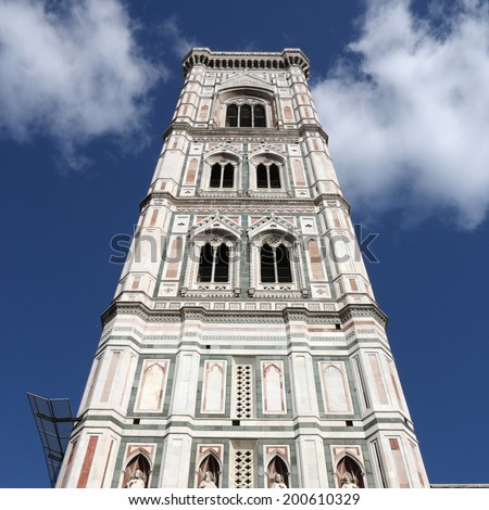 Famous Giotto\'s Campanile - bell tower of Florence cathedral. Architecture in Italy. UNESCO World Heritage Site. Square composition.
