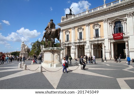 ROME, ITALY - APRIL 8, 2012: Tourists visit Capitoline Hill in Rome. According to Euromonitor, Rome is the 3rd most visited city in Europe (5.5m international tourist arrivals 2009)