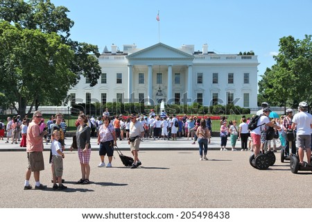 WASHINGTON, USA - JUNE 15, 2013: People visit White House in Washington. 18.9 million tourists visited capital of the United States in 2012.