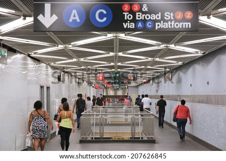 NEW YORK, USA - JULY 3, 2013: People visit a subway station in New York. With 1.67 billion annual rides, New York City Subway is the 7th busiest metro system in the world.