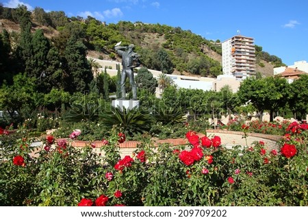 Malaga in Andalusia region of Spain. City park with rose garden.