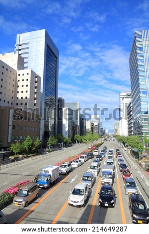 NAGOYA, JAPAN - MAY 3, 2012: People drive in heavy traffic in Nagoya, Japan. With 589 vehicles per capita, Japan is among most motorized countries worldwide, which causes heavy traffic.