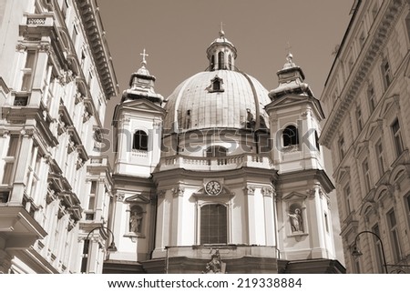 Vienna, Austria - famous Peterskirche (Saint Peter\'s Church). Sepia tone - retro monochrome color style.