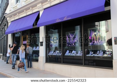 LOS ANGELES, USA - APRIL 5, 2014: Shoppers visit Peter Marco store in Rodeo Drive, Beverly Hills. Rodeo Drive is one of ultimate fashion shopping destinations.