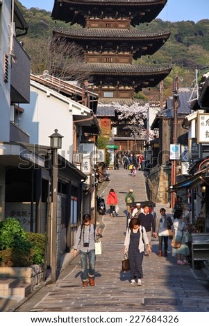 KYOTO, JAPAN - APRIL 17, 2012: People visit old town of Gion district, Kyoto, Japan. Old Kyoto is a UNESCO World Heritage site and was visited by almost 1 million foreign tourists in 2010.