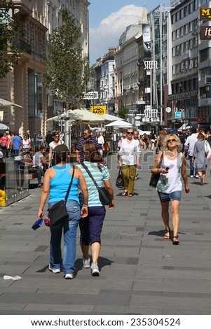 VIENNA, AUSTRIA - SEPTEMBER 5, 2011: People stroll in Karntner Strasse in Vienna. As of 2008, Vienna was the 20th most visited city worldwide (by international visitors).