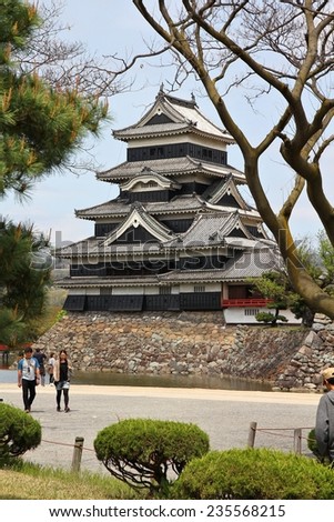 MATSUMOTO, JAPAN - MAY 1, 2012: People visit the Castle in Matsumoto, Japan. Matsumoto Castle is designated National Treasure of Japan and is among oldest castles in country.