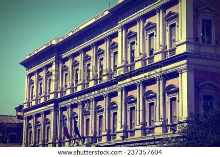 Rome, Italy. Ministry of Agriculture and Forestry - governmental building. Cross processed color style - retro image filtered tone.