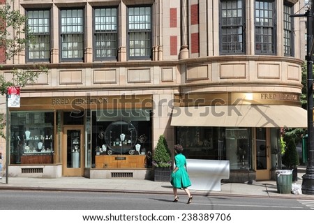 NEW YORK, USA - JULY 2, 2013: Person walks in front of Fred Leighton jewelry store in Madison Avenue, NY. Madison Avenue is one of the most recognized fashion shopping destination in the world.