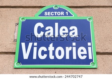 Bucharest, capital city of Romania. Typical street sign at Victory Street (Calea Victoriei).