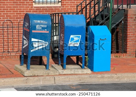 WASHINGTON, USA - JUNE 14, 2013: United States Postal Service mail boxes in Washington DC. USPS employs 626,764 people.