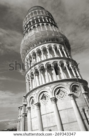 Retro Leaning Tower of Pisa, Italy. Famous landmark, inscribed on UNESCO World Heritage List. Black and white tone - retro monochrome BW color style.