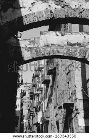 Retro view in Palermo, Sicily island in Italy. Old town street view. Black and white tone - retro monochrome BW color style.