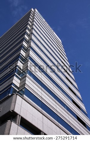 NAGOYA, JAPAN - MAY 3, 2012: Mitsui Sumitomo Insurance Building in Nagoya, Japan. The building was finished in 1994 and is 66 m tall. It is located at famous Sakuradori street.
