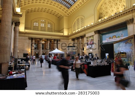 CHICAGO, USA - JUNE 26, 2013: People visit Union Station in Chicago. It is the 3rd busiest rail terminal in the United States serving 120,000 passengers daily.