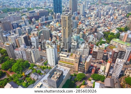 TOKYO, JAPAN - MAY 10, 2012: Modern cityscape view in Tokyo, Japan. Tokyo is the capital city of Japan and the most populous metropolitan area in the world with almost 36 million people.
