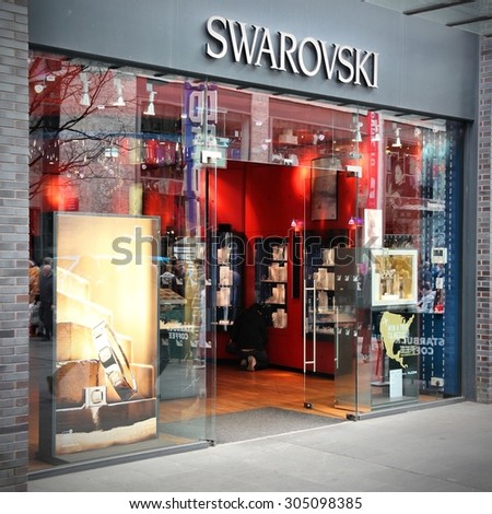 LIVERPOOL, UK - APRIL 20, 2013: People shop at Swarovski in Liverpool, UK. In 2011 Swarovski had 2.87 billion EUR revenue and employed 31.458 people.