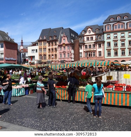 MAINZ, GERMANY - JULY 19, 2011: Tourists stroll in Mainz, Germany. According to its Tourism Office, the town has up to 800,000 overnight visitor stays annually.
