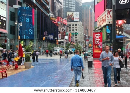 NEW YORK, UNITED STATES - JUNE 10, 2013: People visit Times Square in New York. Times Square is one of most recognized landmarks in the world. More than 300,000 people pass through Times Square daily.