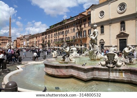 ROME, ITALY - MAY 13, 2010: Tourists visit Piazza Navona in Rome, Italy. According to Euromonitor, Rome is the 3rd most visited city in Europe (5.5m international tourist arrivals 2009)