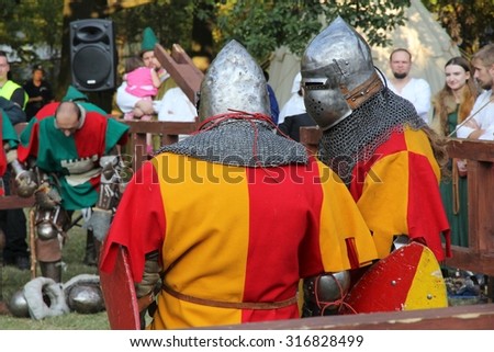 BYTOM, POLAND - SEPTEMBER 12, 2015: Knights take part in 2nd Bytom Medieval Fair in Poland. The event is part of celebration for city\'s 760th anniversary.