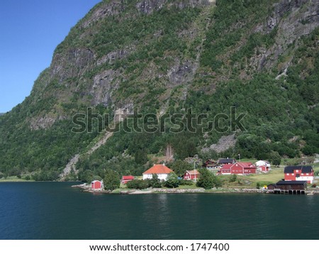 Town by the fjord in Norway. Typical Scandinavian houses near the Sognefjord in Sogndal, Norway, Scandinavia, Europe.