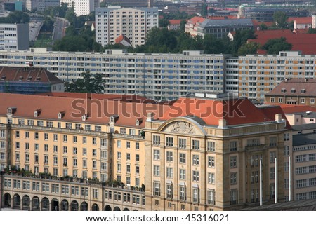 Old Dresden in the foreground and modern buildings from communist era in background. City in Germany.