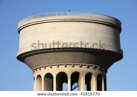 Huge, generic water tower in Madrid, Spain. Water supply infrastructure.