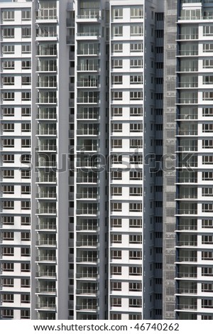 Residential skyscraper close-up in Kuala Lumpur, Malaysia. Urban background texture.