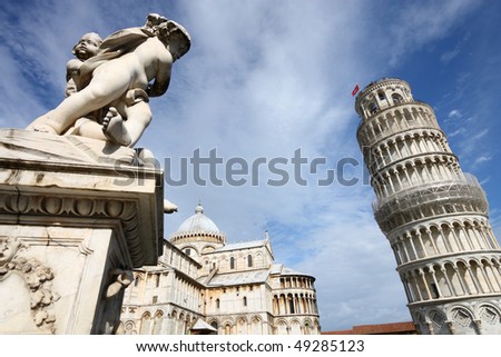 Leaning Tower, angel statues and the famous cathedral of Pisa, Italy. Landmark, inscribed on UNESCO World Heritage List.