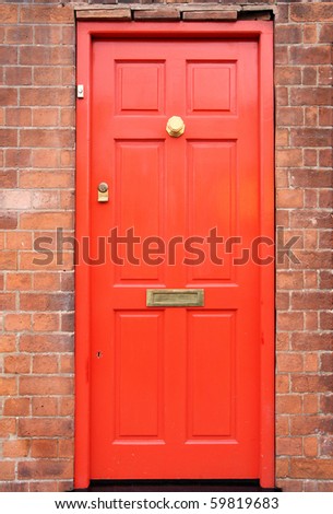 Birmingham. Old brick building and red door. West Midlands, England.