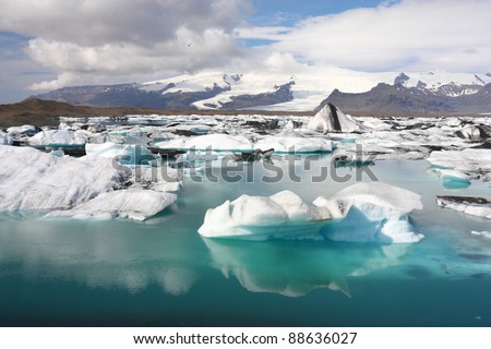 Iceberg on Jokulsarlon lagoon in Iceland. Famous lake. Travel destination for tourists next to Vatnajokull glacier.