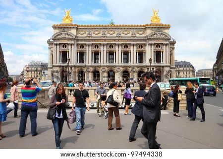PARIS - JULY 22: Tourists visit Opera Garnier on July 22, 2011 in Paris, France. Opera Garnier is a popular landmark among tourists in Paris, the most visited city worldwide.