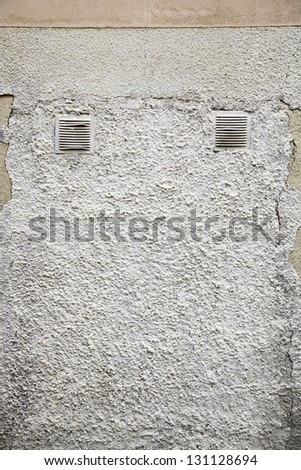 Cement wall grids, detail in the city wall, background with texture urban