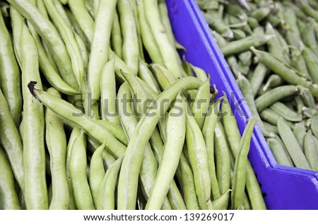 Green beans and peas, detail of vegetables in a market, food healthy, diet