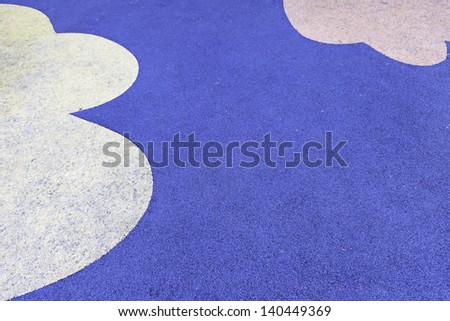 Rubber flooring decoration, detail of the floor decorated in a playground