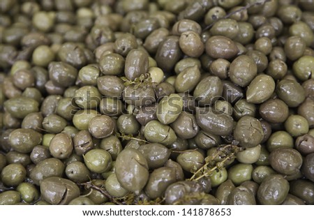 Olive brown, detail of typical Spanish food, food background, shop and market