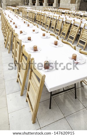 Large dining table, detail of a table at a popular food in town, lots of it