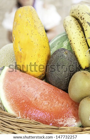 Different tropical fruits, detail of a tray with different fresh fruits, healthy lifestyle food, sweet