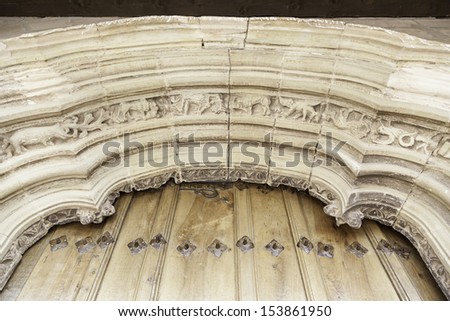 Old porch of a church, detail of a gothic church decoration in ne Spain, ancient art
