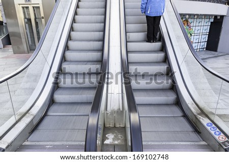 Escalators in the city, transportation up and down, help pedestrians, metal