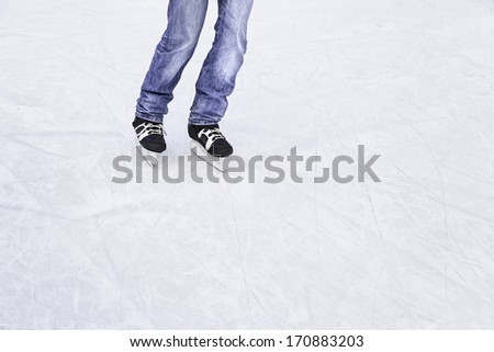 Skating on the ice, skating young person in an ice rink, winter sports, cold and fun
