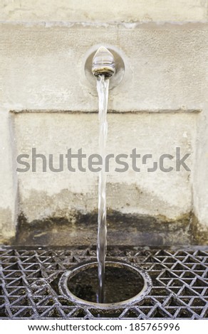Antique water fountain, detail of a source for drinking water, drinking water