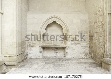 Stone wall inside a church, detail of the interior of a monument in ruins, ruin and abandonment
