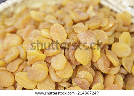 Dried apricots on a market, detail of dried fruit, healthy lifestyle food, fruit and diet