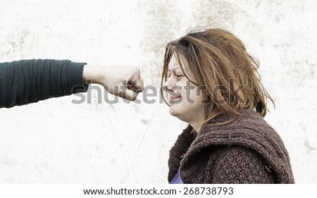 Battered and beaten woman, detail of abuse and violence