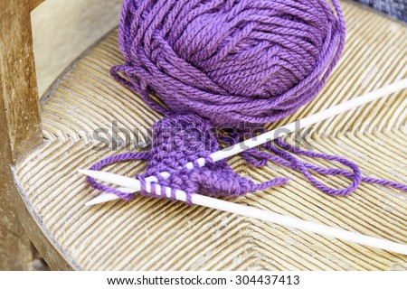 Clews and knitting needles, detail to make clothes