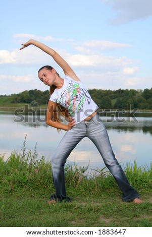 girl does morning exercises on the nature Stok fotoğraf © 