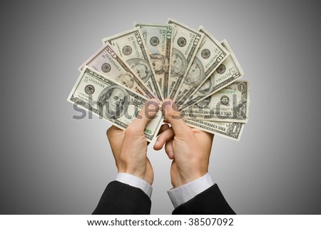 American dollars in a hands. money concept