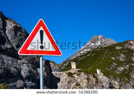 warning sign on a mountain road